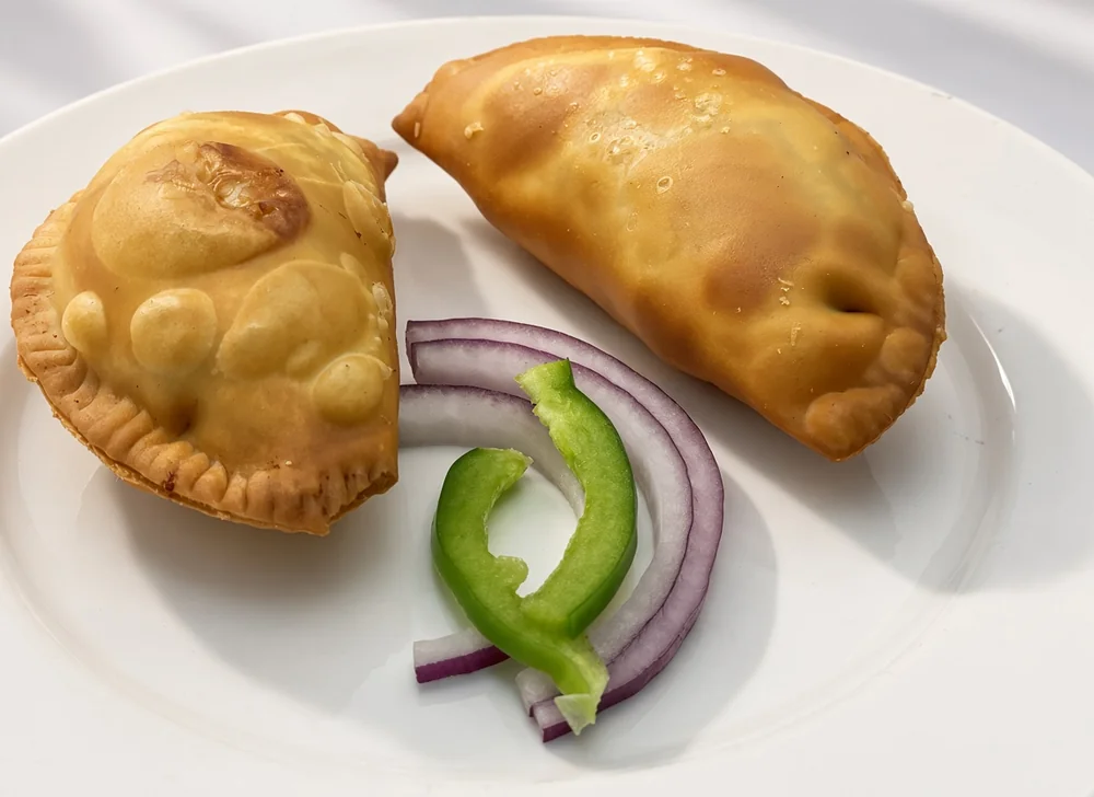 Golden beef or chicken empanadas, Latin American food at JC's Tacos and More in Winnipeg